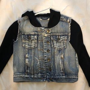 Denim jacket with black sleeves